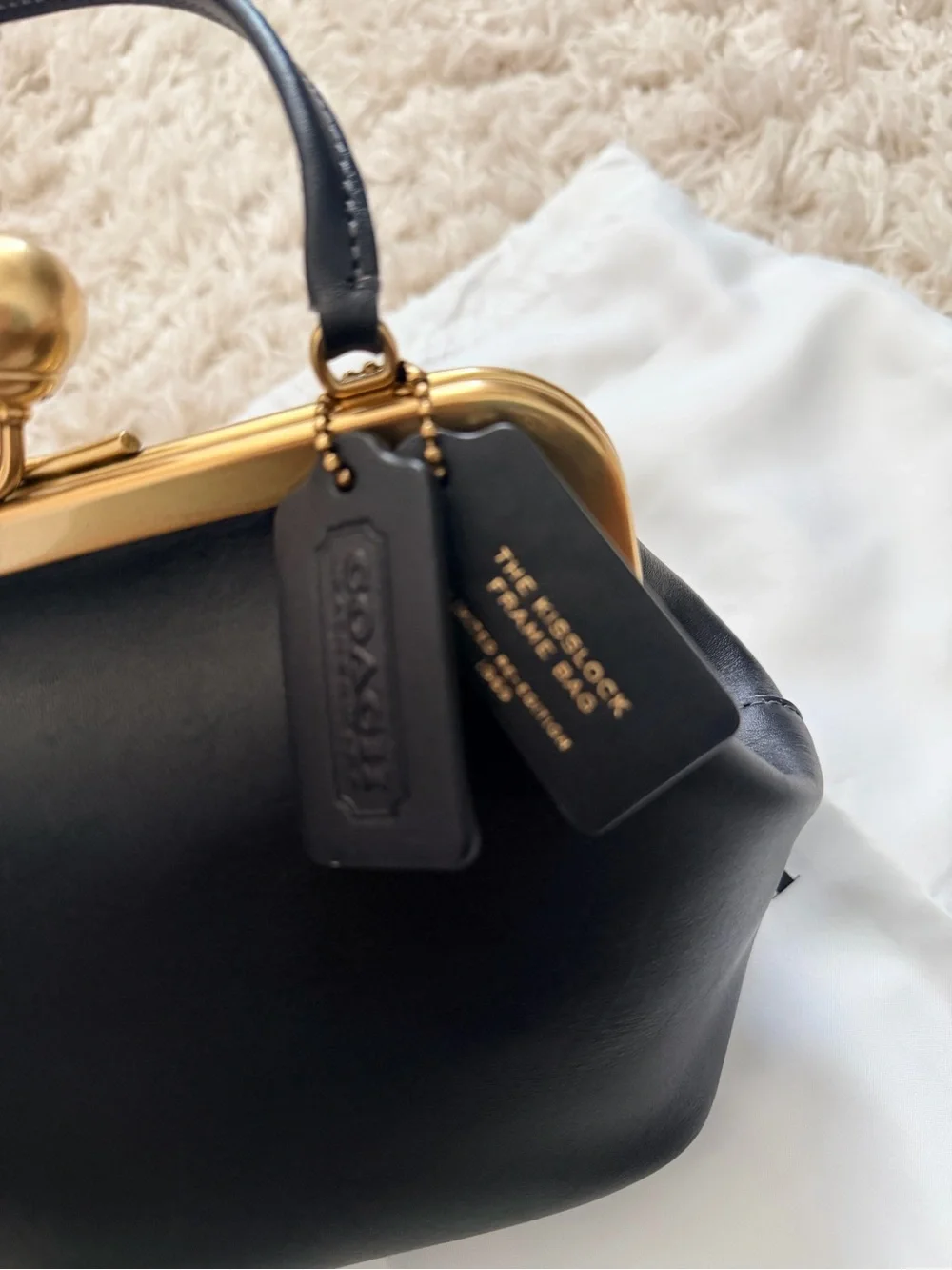 Coach Black Leather Kiss-Lock Wristlet with Gold Frame